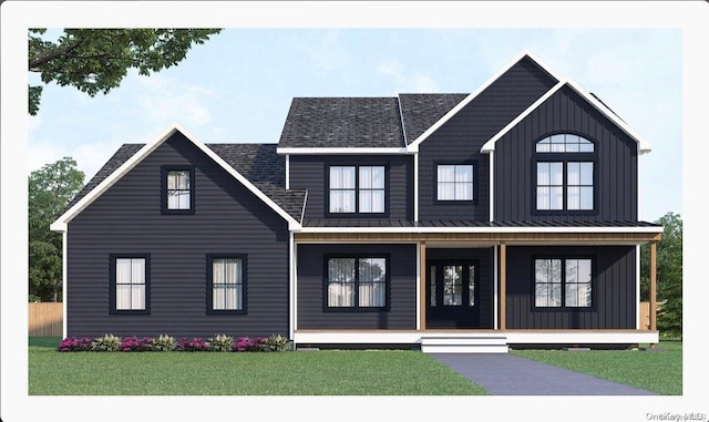 view of front of property featuring a porch and a front lawn