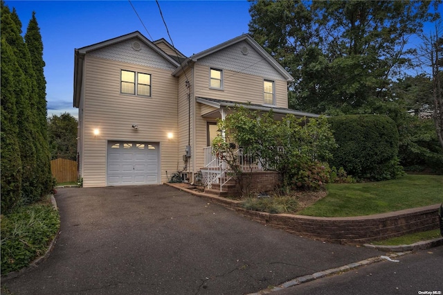 view of front of property with a garage