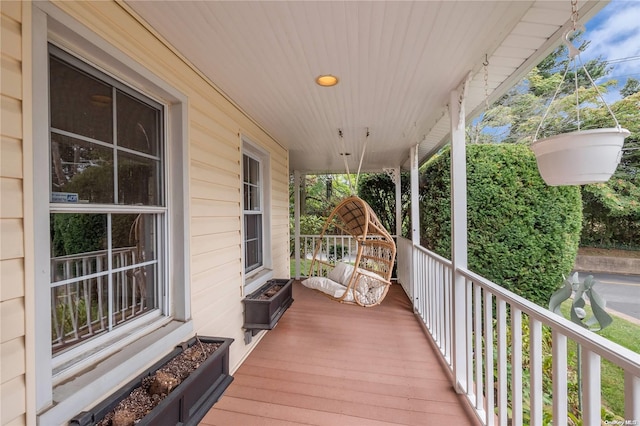 wooden deck featuring a porch