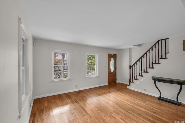 foyer with light wood-type flooring