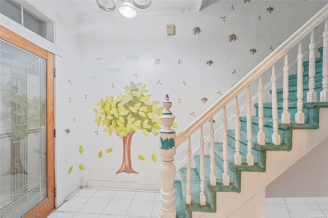 staircase featuring tile patterned flooring