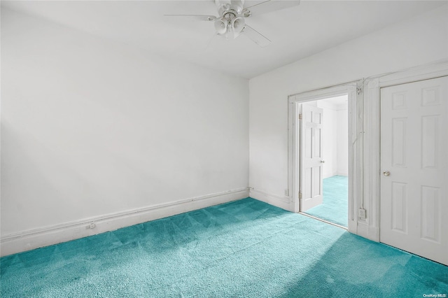 unfurnished bedroom featuring carpet flooring, ceiling fan, and a closet