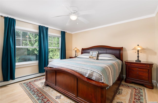 bedroom featuring light wood-type flooring, a baseboard radiator, ceiling fan, and crown molding