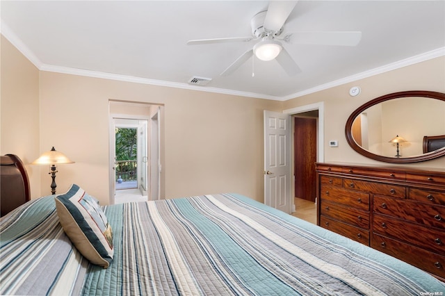 bedroom with ceiling fan and crown molding