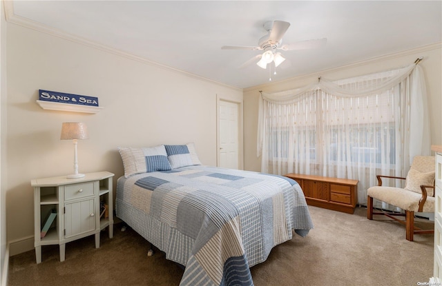 bedroom featuring carpet flooring, ceiling fan, and ornamental molding