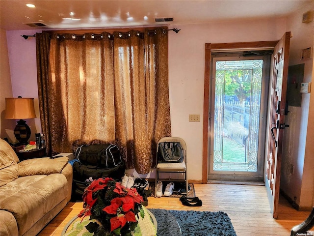 sitting room featuring light hardwood / wood-style flooring