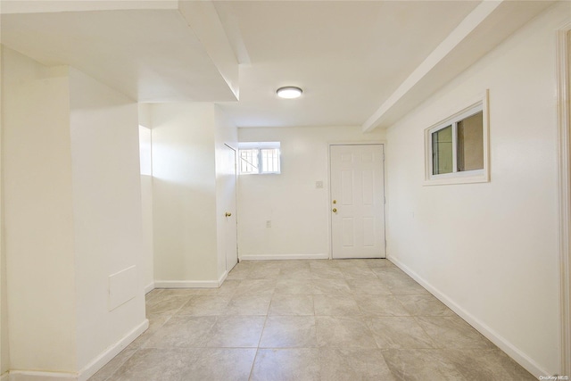 basement with light tile patterned floors