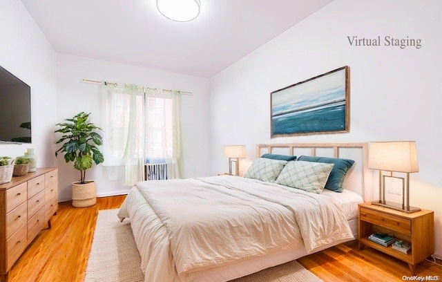 bedroom featuring light wood-type flooring