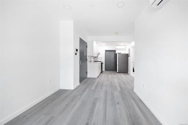 hall featuring light hardwood / wood-style floors