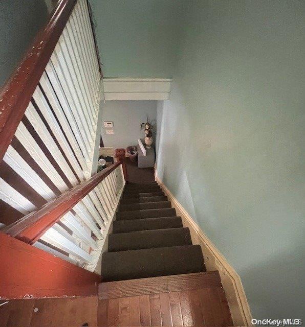 84-09 107th Ave, Ozone Park, NY 11417 - staircase with baseboards
