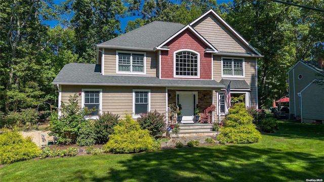 view of front of property with a front lawn