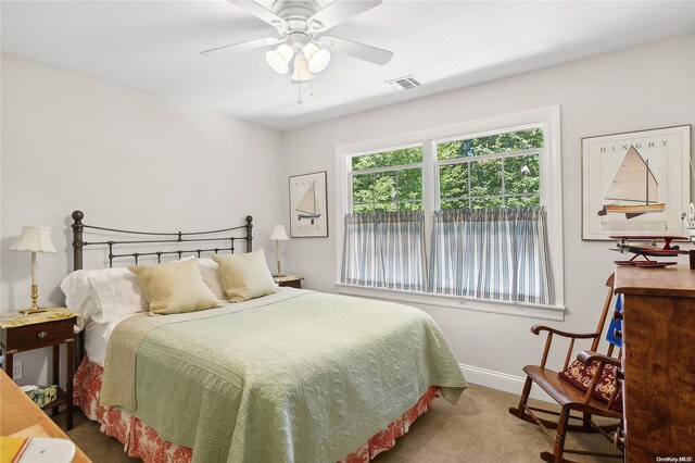 bedroom with carpet flooring and ceiling fan