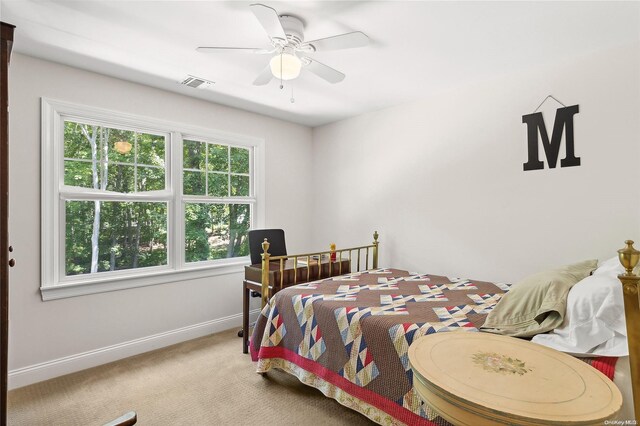 bedroom featuring carpet and ceiling fan