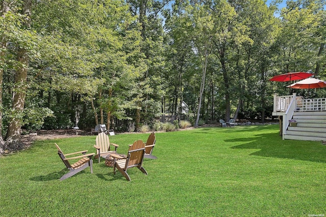 view of yard with a wooden deck