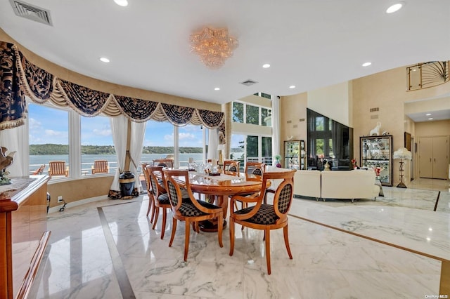 dining room with a water view