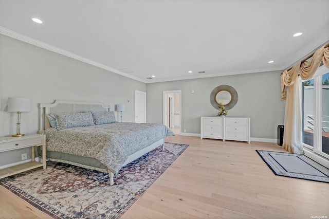 bedroom featuring light hardwood / wood-style flooring and ornamental molding