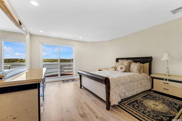 bedroom featuring light hardwood / wood-style floors