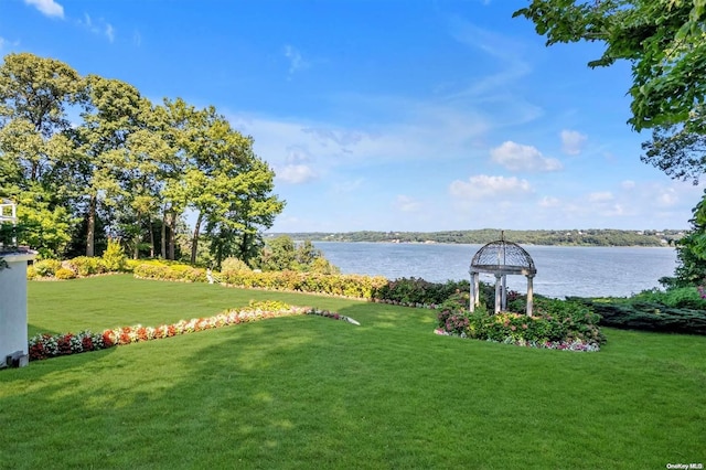 view of yard with a water view