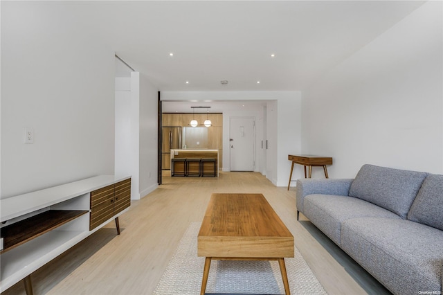 living room with light hardwood / wood-style floors