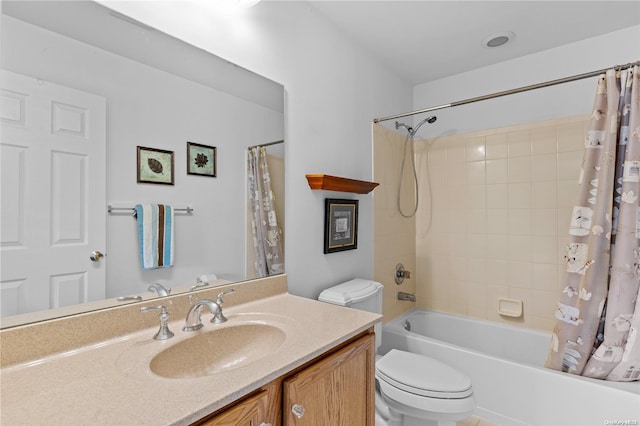 full bathroom featuring shower / bath combination with curtain, vanity, and toilet