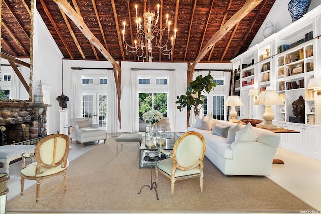 carpeted living room with french doors, a fireplace, beamed ceiling, wood ceiling, and a chandelier