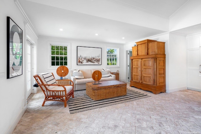 living room with plenty of natural light and crown molding