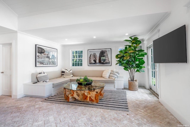 living room featuring crown molding