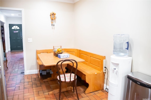 dining room with crown molding