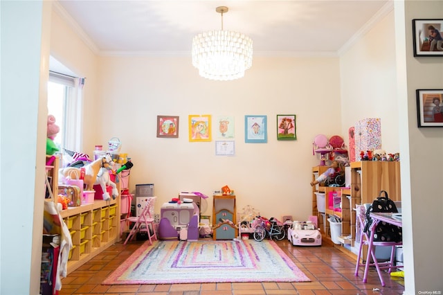 playroom with crown molding and a notable chandelier