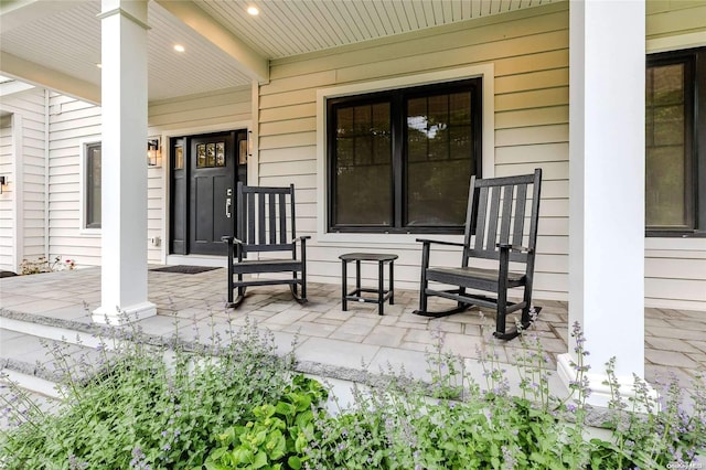 doorway to property with a porch