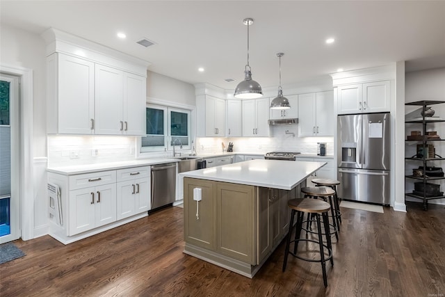 kitchen with white cabinetry and stainless steel appliances