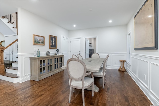 dining area featuring dark hardwood / wood-style floors