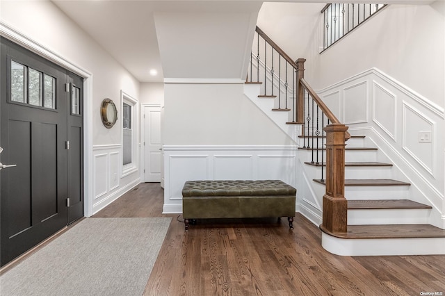 entryway with dark hardwood / wood-style floors