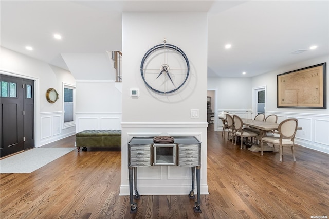 foyer entrance with hardwood / wood-style floors