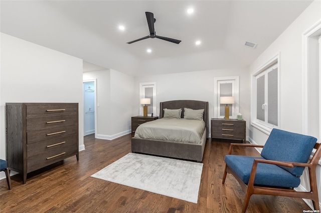 bedroom with ceiling fan and dark wood-type flooring