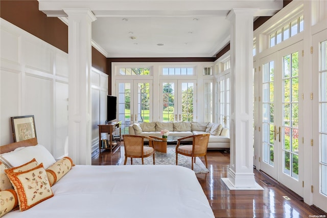 11 Dupont Ct, Brookville, NY 11548 - bedroom featuring ornate columns, a decorative wall, crown molding, access to exterior, and multiple windows