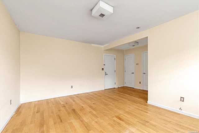 unfurnished room featuring light hardwood / wood-style flooring