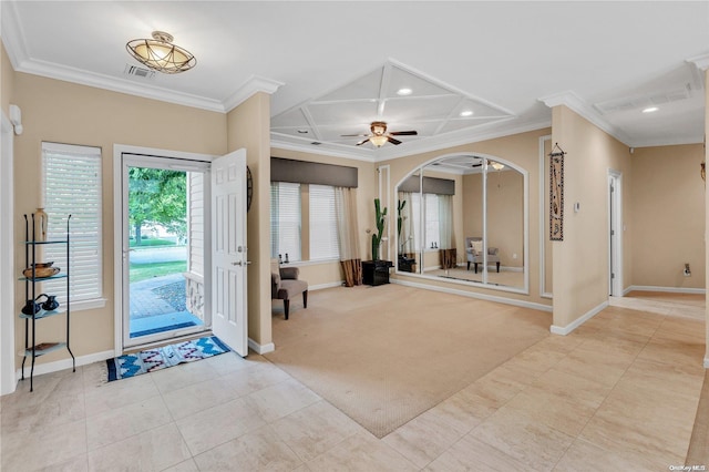 foyer entrance with ceiling fan, crown molding, light colored carpet, and coffered ceiling