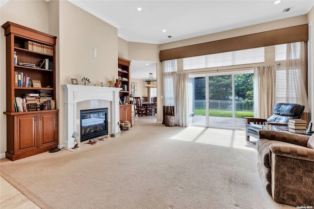 living room featuring light colored carpet and ornamental molding