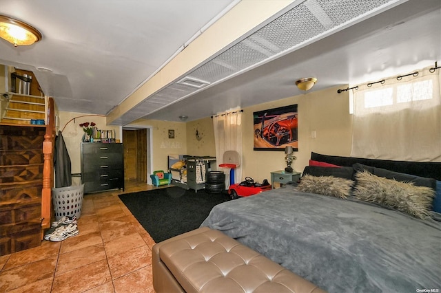 bedroom with tile patterned floors