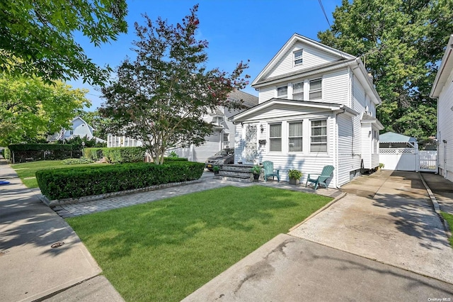 view of front of home featuring a front lawn