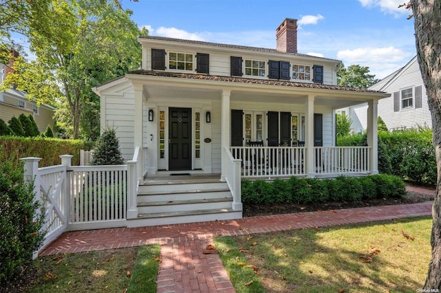 view of front facade featuring covered porch