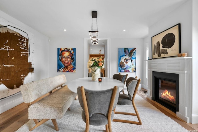 dining area featuring light wood-type flooring