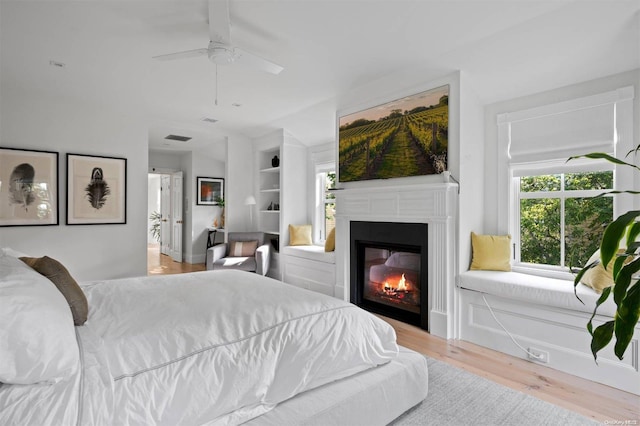 bedroom featuring ceiling fan and light wood-type flooring