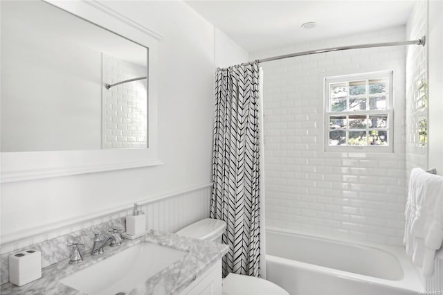 full bathroom with vanity, toilet, and shower / bathtub combination with curtain