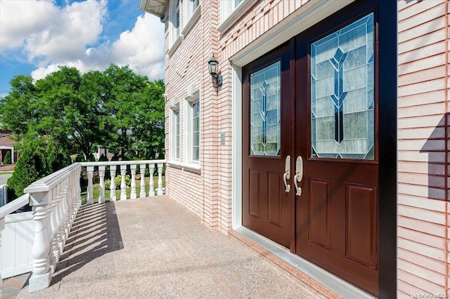 entrance to property with a porch