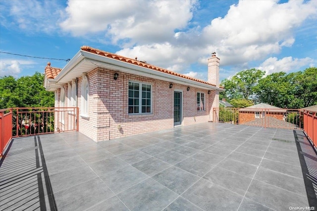 back of house featuring a patio area