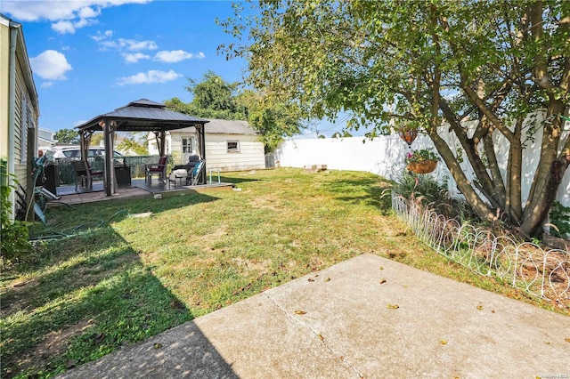 view of yard with a gazebo and a patio area