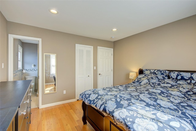 bedroom with light hardwood / wood-style flooring