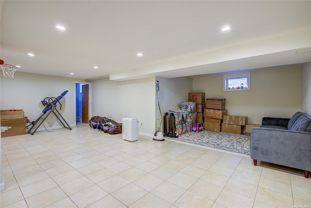 basement featuring light tile patterned floors